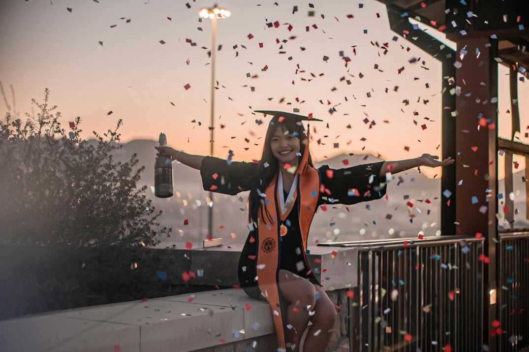 person celebrating course completion